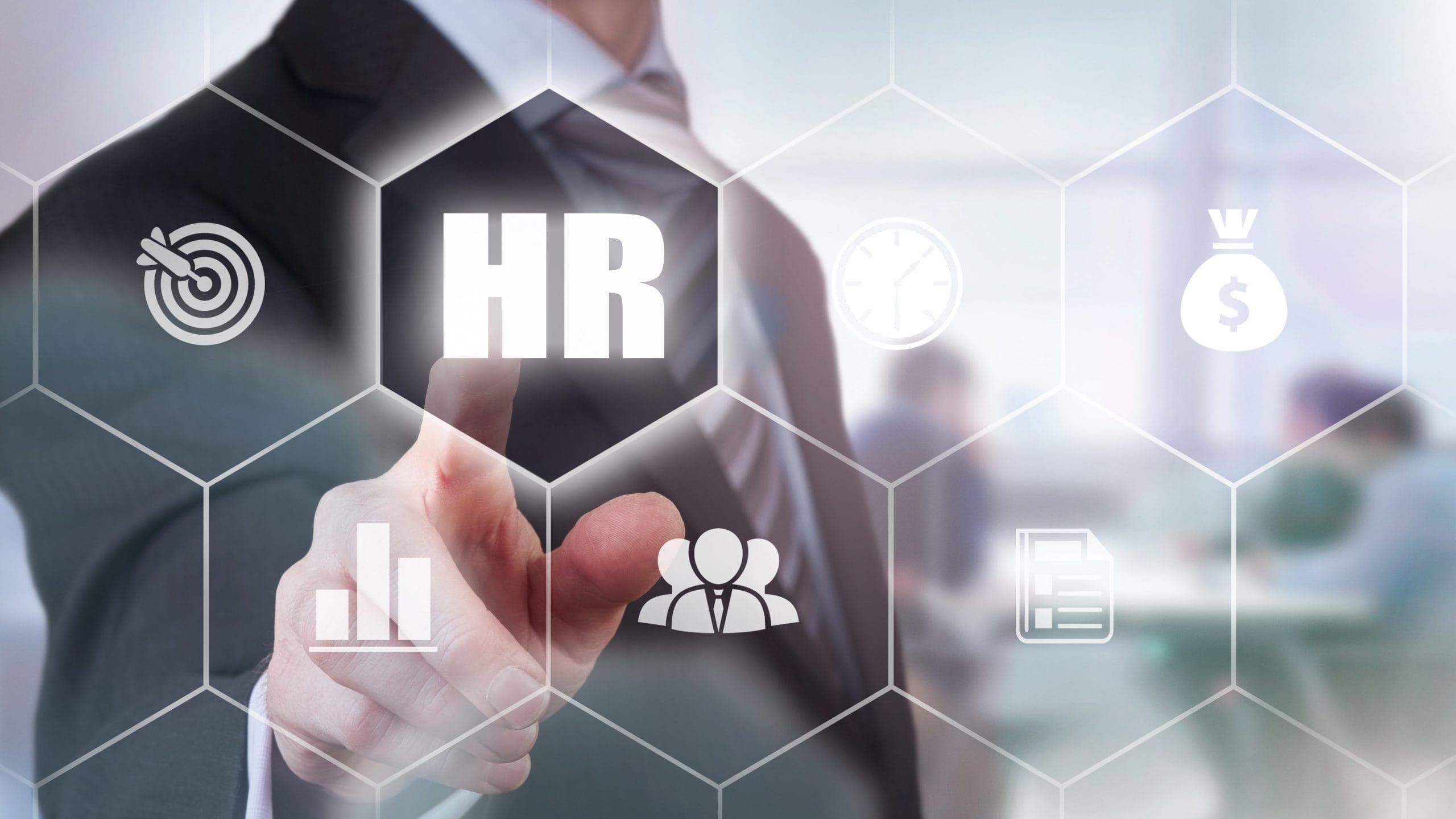 a man pressing the HR button; Can You Put an Age Requirement on a Job Posting?