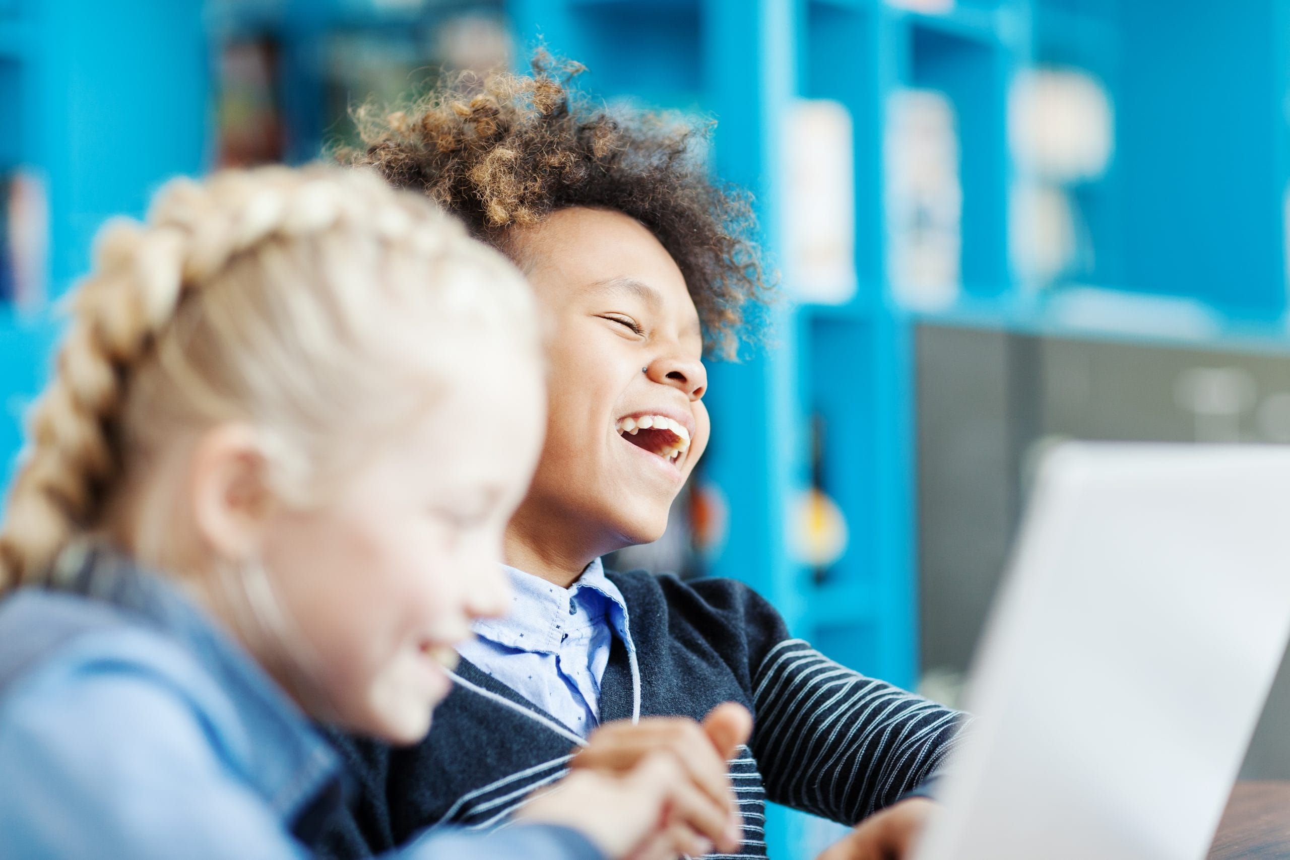 two kids laughing