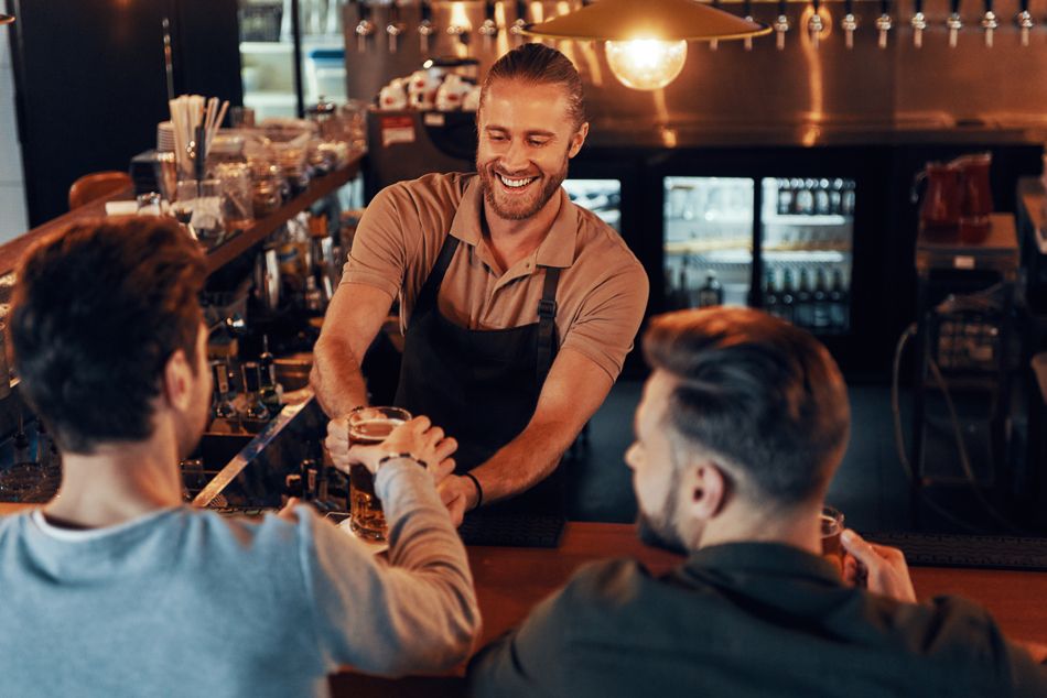 bartender serving drinks; how to get a bartending license