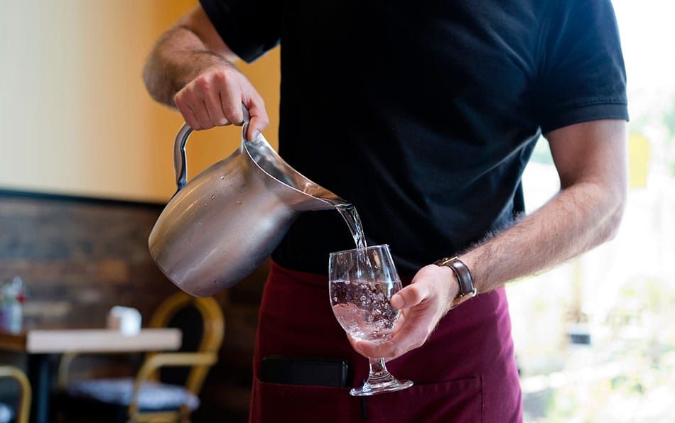 waiter in a t-shirt