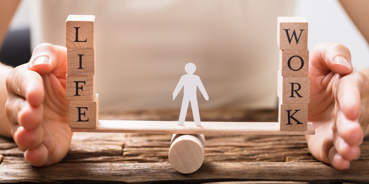 paper man balacing between life and work