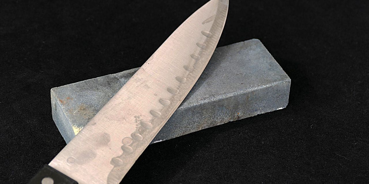 knife and a sharpening stone