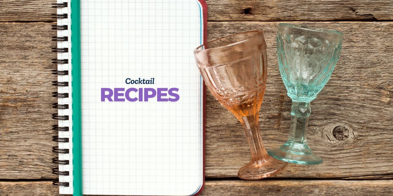 a notebook with cocktail recipes