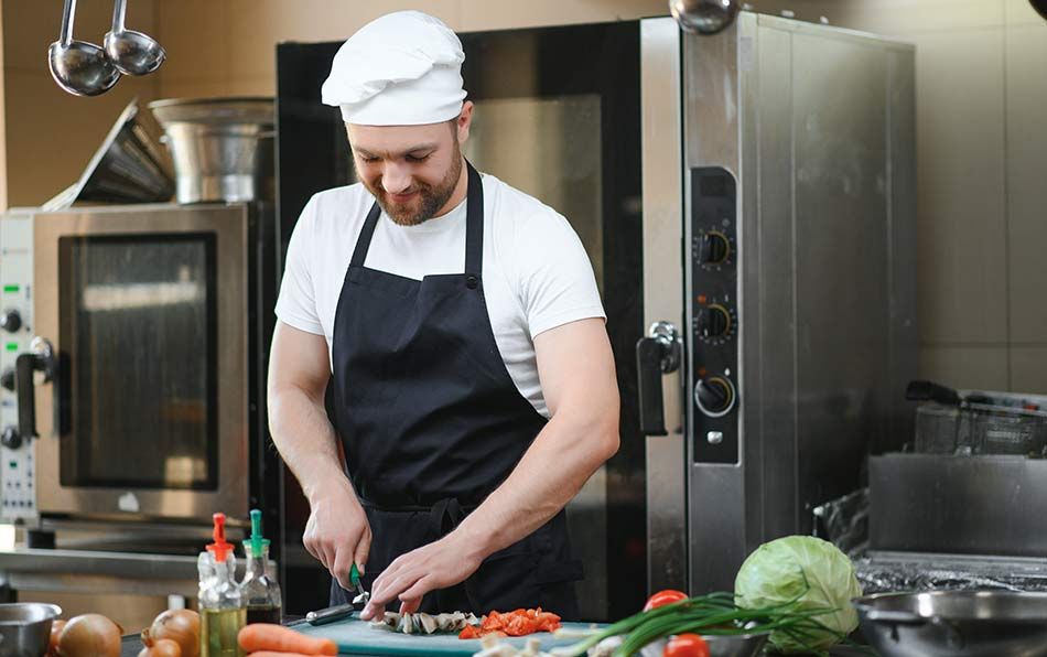 cook chopping ingredients