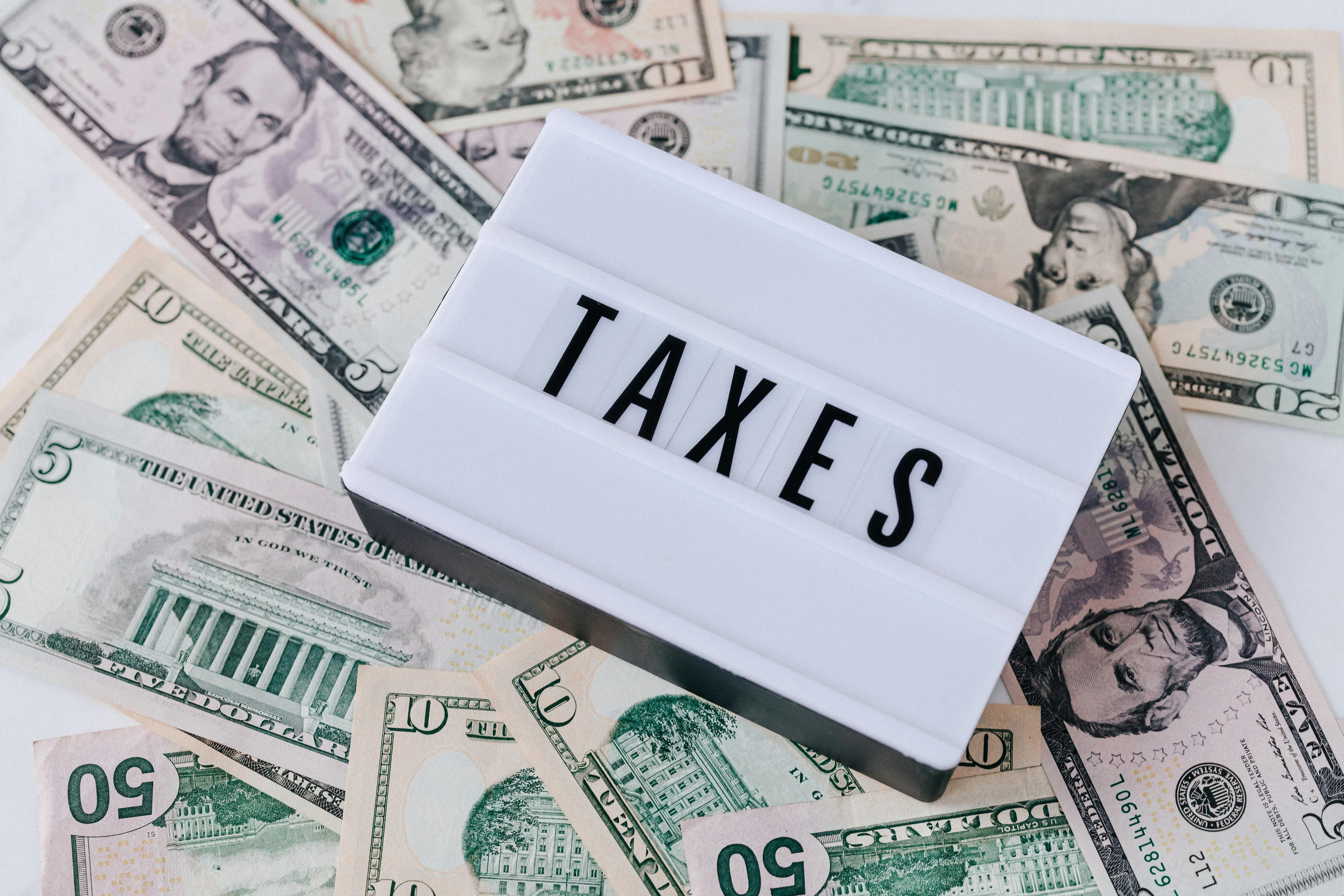 taxes and dollars