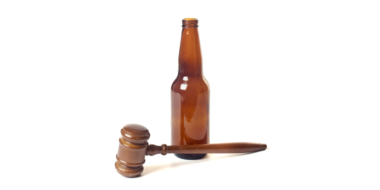 beer bottle and a gavel