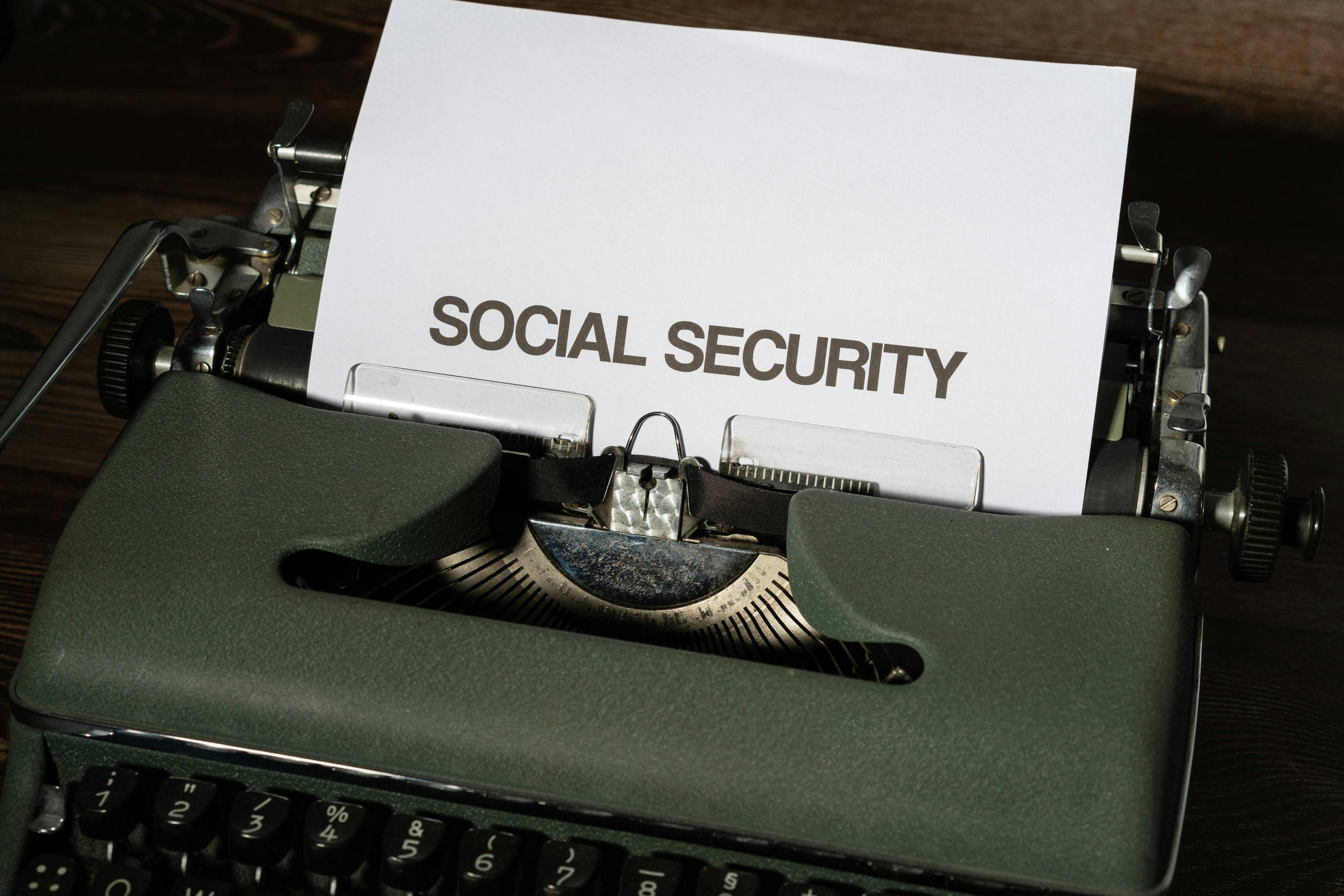 social security page coming out of typewriter