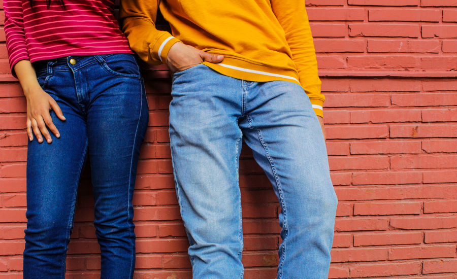 A man and a woman's legs in jeans