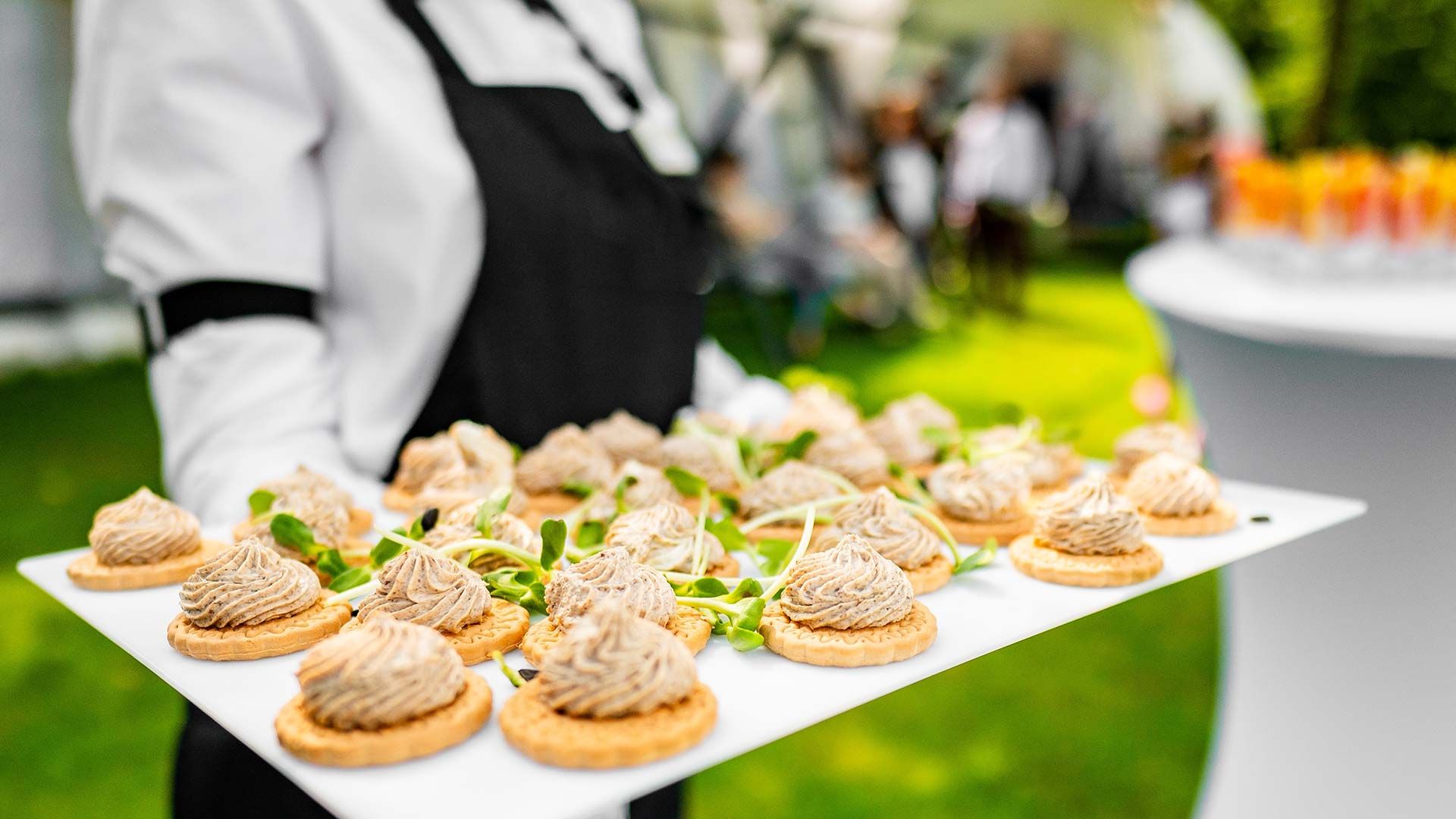 banquet server serving food