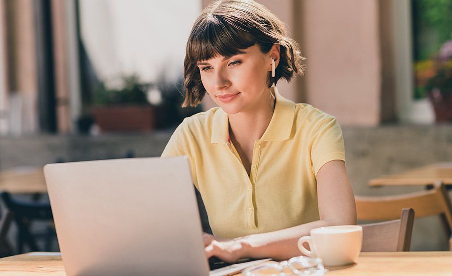 Photo of nice young brunette lady work laptop wear yellow t-shirt outside in park