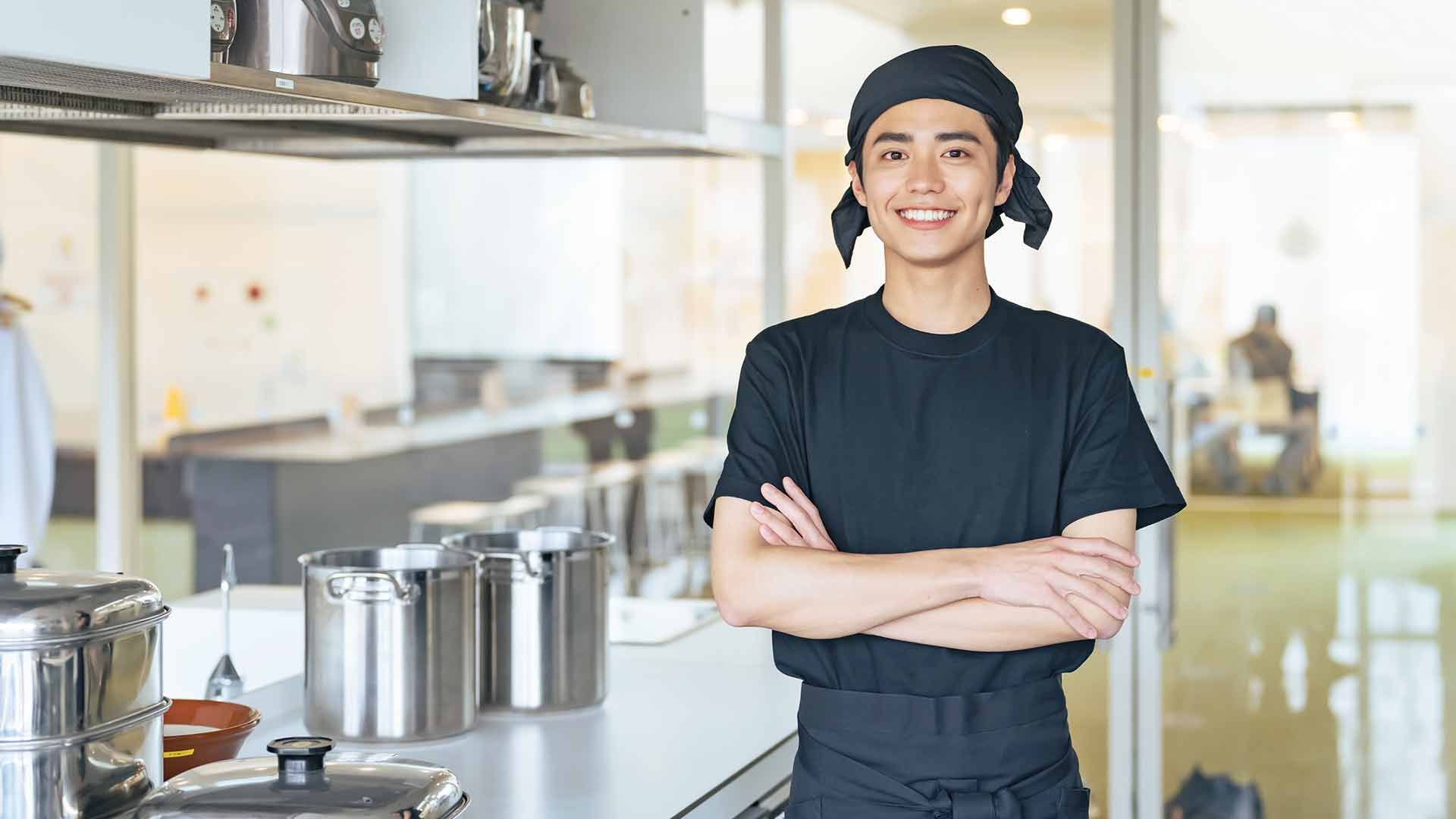 smiling commis chef